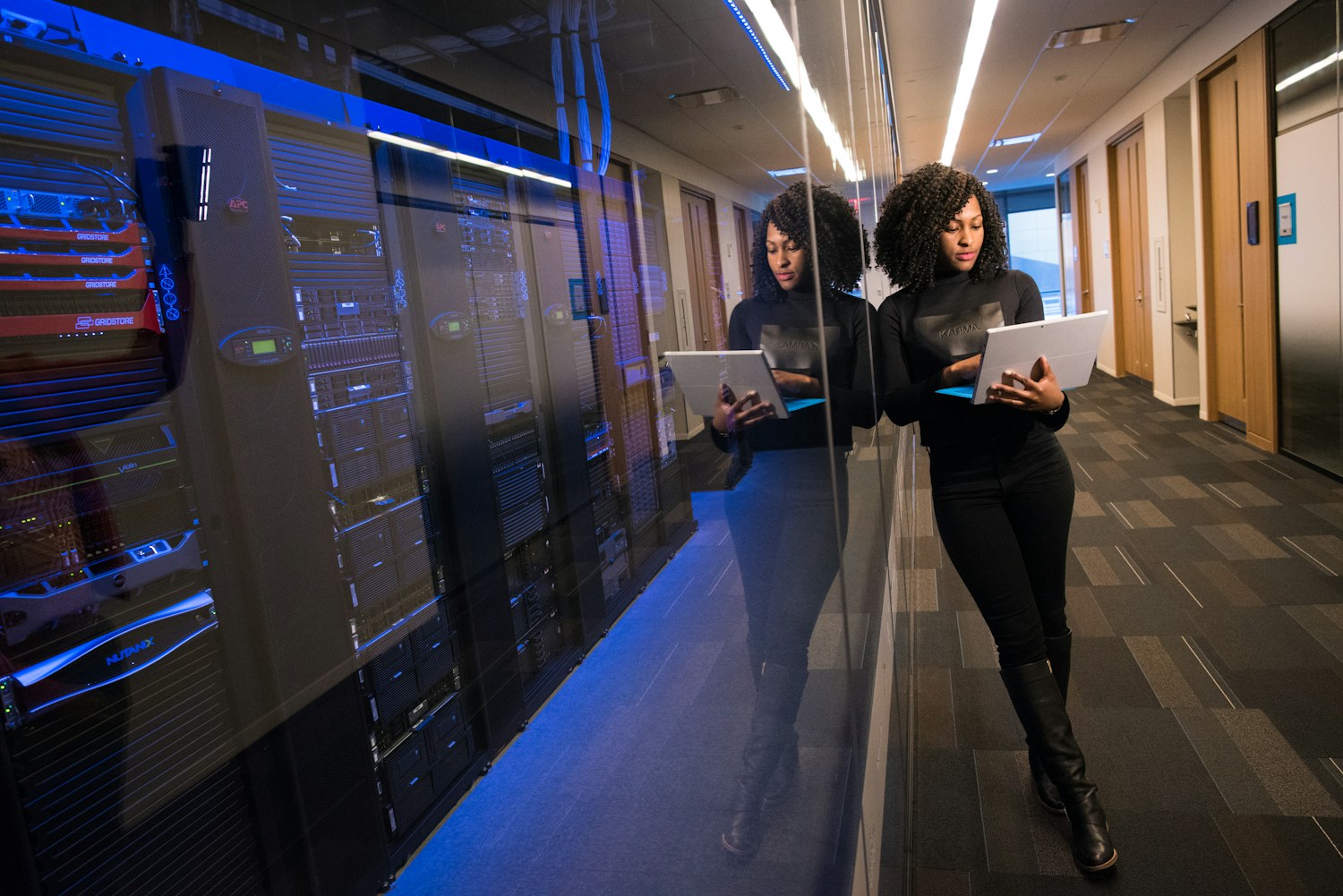 Kyzen specialists collaborating in a digital command center